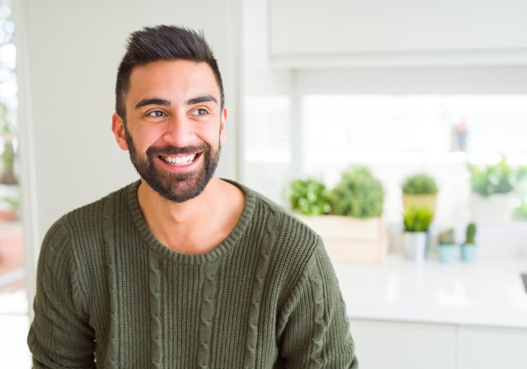 Smiling man in addiction treatment program in Illinois